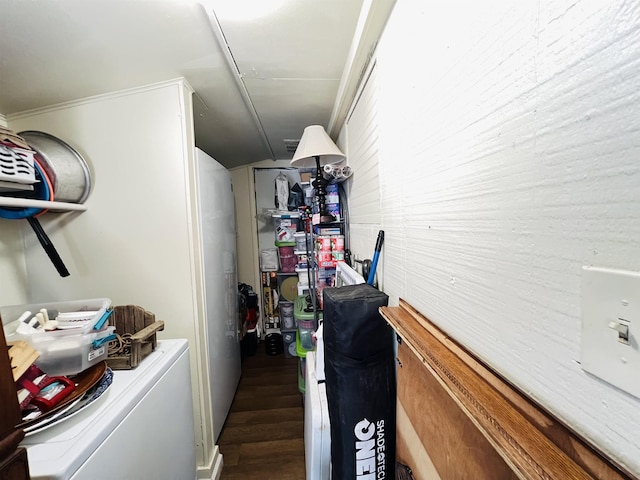 clothes washing area with laundry area and wood finished floors