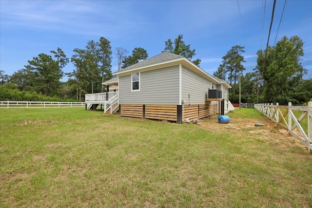 8679 Massey Lake Rd, Silsbee, TX 77656 - rear view of property featuring a fenced backyard, a deck, and stairway