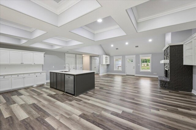 8679 Massey Lake Rd, Silsbee, TX 77656 - kitchen with open floor plan, dishwasher, white cabinets, recessed lighting, and an island with sink