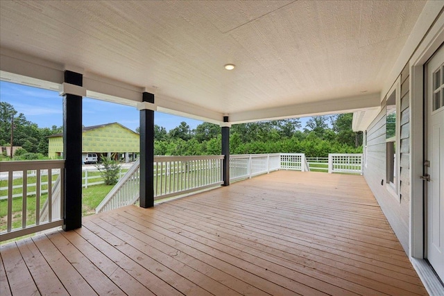 8679 Massey Lake Rd, Silsbee, TX 77656 - wooden terrace featuring view of scattered trees