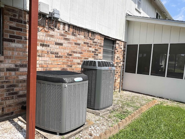 exterior view of central AC and brick siding