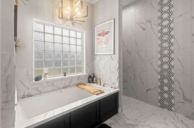 9655 Grapevine Dr, Orange, TX 77630 - full bath with a tub, a marble finish shower, and a chandelier