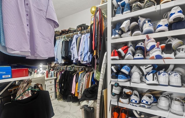 9655 Grapevine Dr, Orange, TX 77630 - walk in closet featuring marble look tile flooring
