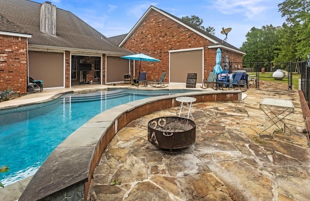 9655 Grapevine Dr, Orange, TX 77630 - view of pool featuring a fire pit and a patio