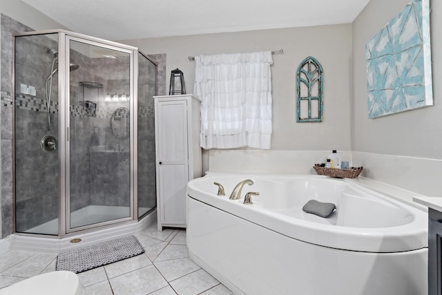 bathroom featuring separate shower and tub and tile patterned flooring