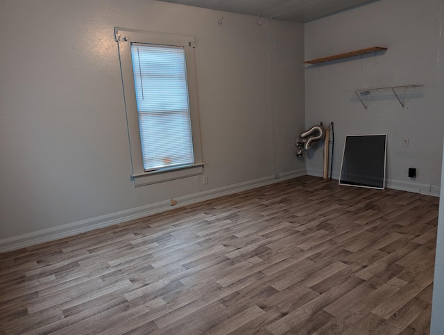 spare room featuring light wood-type flooring