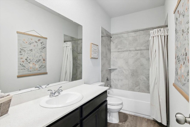 full bathroom featuring toilet, vanity, shower / tub combo with curtain, and hardwood / wood-style floors