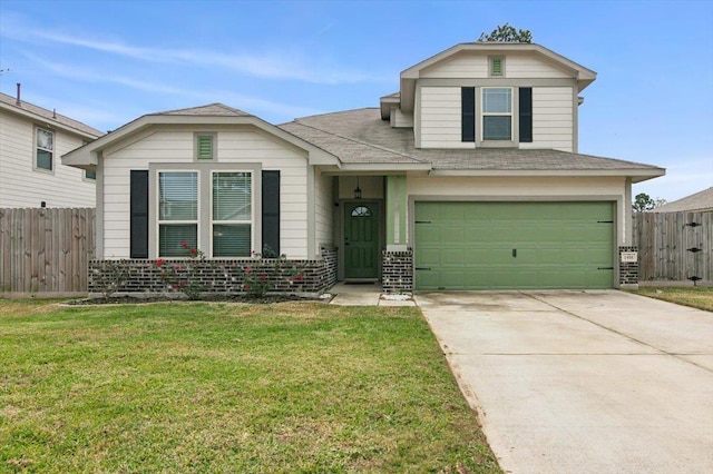 view of front of house featuring a garage and a front yard