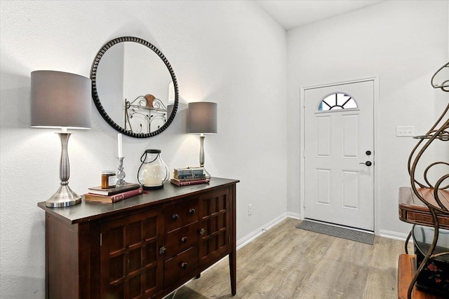 foyer entrance featuring light hardwood / wood-style flooring