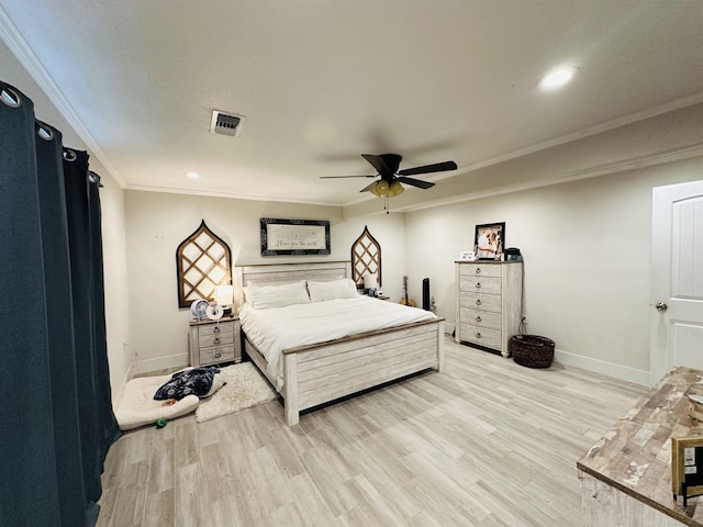 bedroom featuring ceiling fan, light wood-type flooring, and ornamental molding