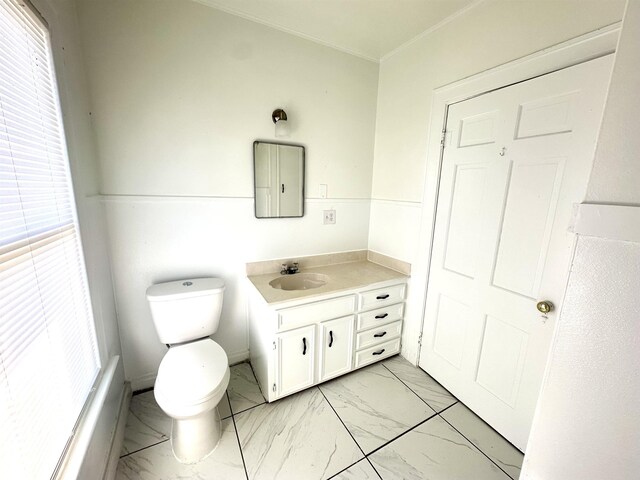 bathroom with vanity and toilet