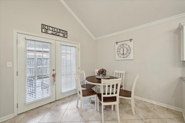 211 Skylark Ave, Bridge City, TX 77611 - tiled dining area with vaulted ceiling, ornamental molding, french doors, and baseboards