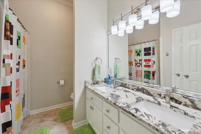 211 Skylark Ave, Bridge City, TX 77611 - full bathroom featuring double vanity, tile patterned floors, toilet, baseboards, and curtained shower