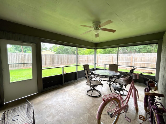 4400 Bethany St, Port Arthur, TX 77642 - sunroom featuring ceiling fan and outdoor dining area