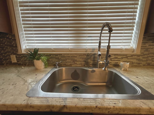 4400 Bethany St, Port Arthur, TX 77642 - kitchen view of tasteful backsplash and a sink