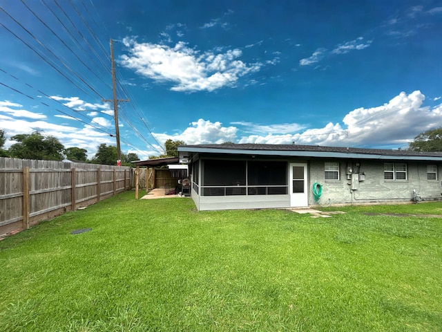 4400 Bethany St, Port Arthur, TX 77642 - back of house featuring a sunroom and brick siding