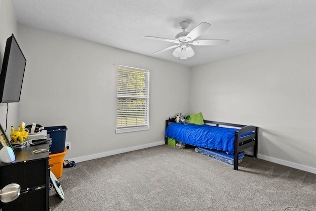 3329 Model Dr, Kountze, TX 77625 - bedroom featuring carpet flooring, baseboards, and a ceiling fan
