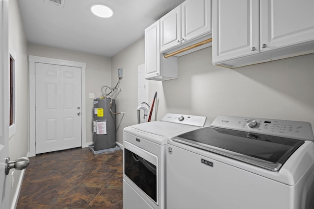 3329 Model Dr, Kountze, TX 77625 - laundry room with electric water heater, washing machine and dryer, cabinet space, and baseboards