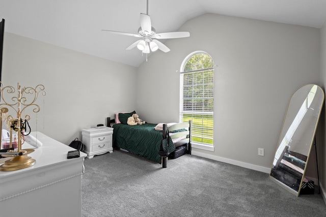 3329 Model Dr, Kountze, TX 77625 - carpeted bedroom with vaulted ceiling, a ceiling fan, and baseboards