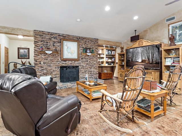 living room featuring a stone fireplace, built in features, and vaulted ceiling