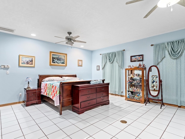 bedroom featuring light tile patterned floors and ceiling fan