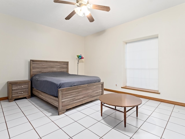 bedroom featuring light tile patterned floors and ceiling fan