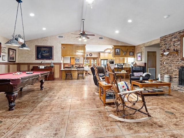 rec room featuring vaulted ceiling with beams, ceiling fan, wooden walls, and billiards