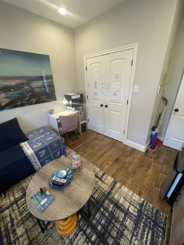 living room with dark wood-type flooring