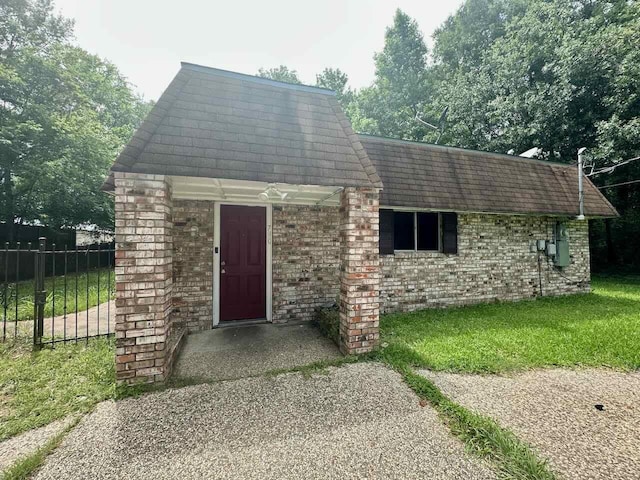 790 Pinchback Rd, Beaumont, TX 77707 - view of front of house with brick siding and roof with shingles