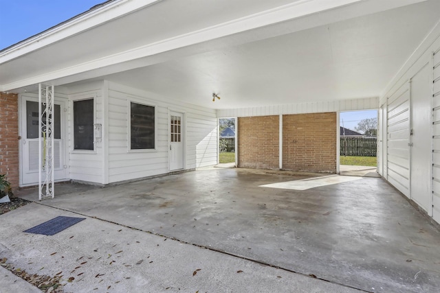 exterior space with a carport