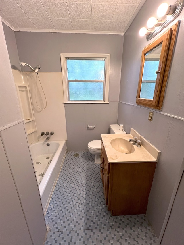 full bathroom with vanity, toilet, shower / washtub combination, and crown molding