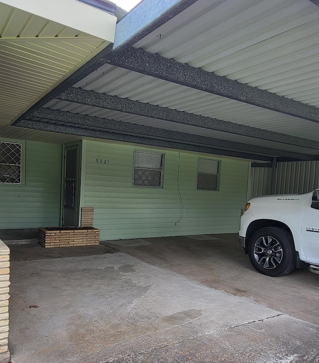 view of property exterior with a carport