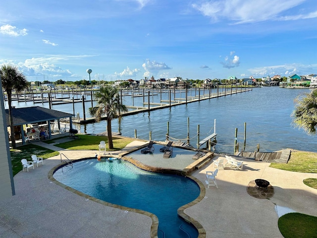 560 Pleasure Island Blvd, Port Arthur, TX 77640 - community pool featuring a dock, a patio, and a water view