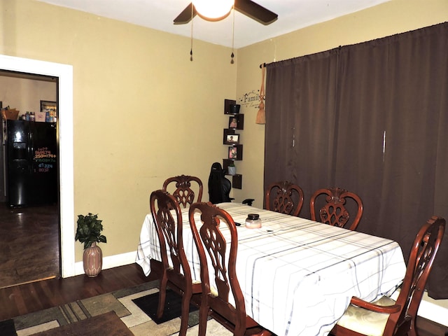 4545 Hollywood Dr, Port Arthur, TX 77642 - dining space featuring ceiling fan, wood finished floors, and baseboards