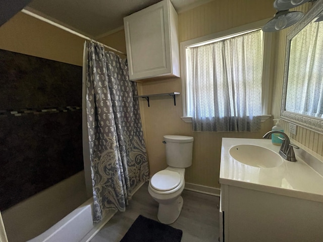 full bathroom featuring shower / bath combo, toilet, and vanity