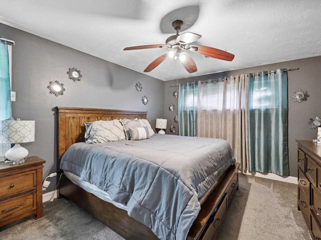 4015 42nd St, Port Arthur, TX 77642 - carpeted bedroom with ceiling fan and a textured ceiling