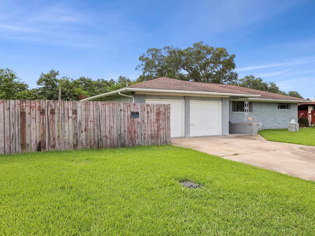 4015 42nd St, Port Arthur, TX 77642 - view of side of property featuring driveway, an attached garage, and brick siding