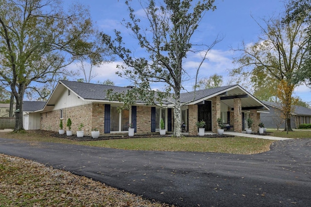 5855 Gladys Ave, Beaumont, TX 77706 - view of front of house with brick siding