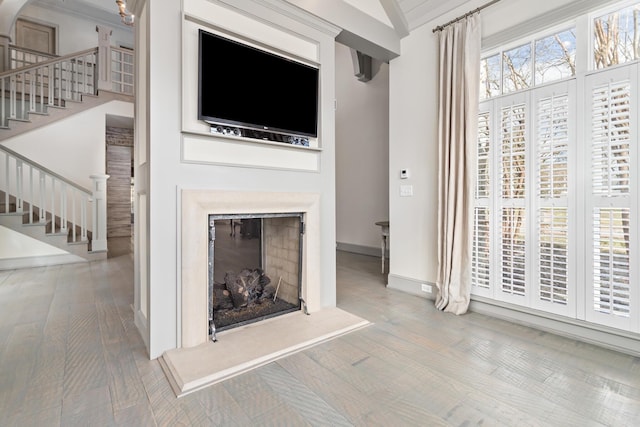 unfurnished living room featuring light hardwood / wood-style flooring