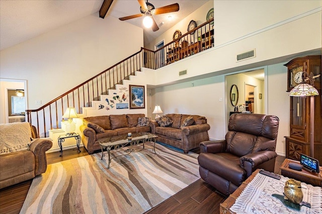 living room with beamed ceiling, wood-type flooring, high vaulted ceiling, and ceiling fan