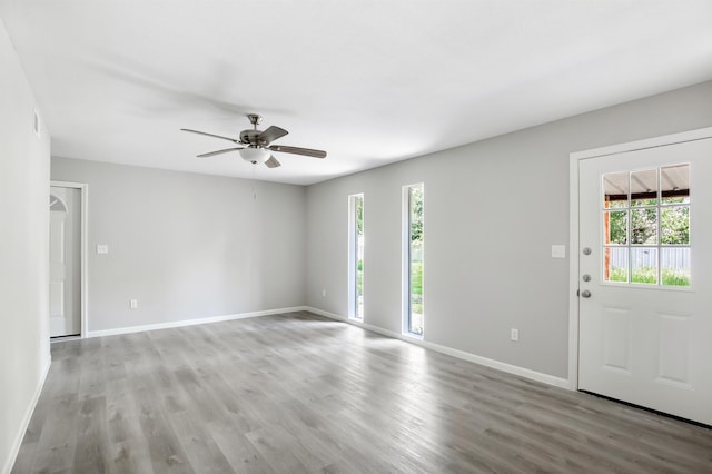 interior space featuring ceiling fan and light wood-type flooring