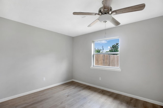 unfurnished room featuring ceiling fan and light hardwood / wood-style flooring