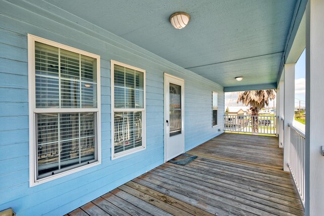 wooden terrace with covered porch