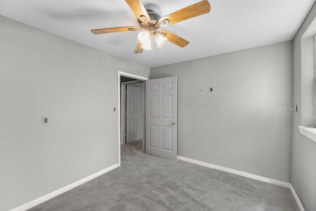 18425 Ramsey Rd, Crosby, TX 77532 - unfurnished bedroom featuring light colored carpet and a ceiling fan