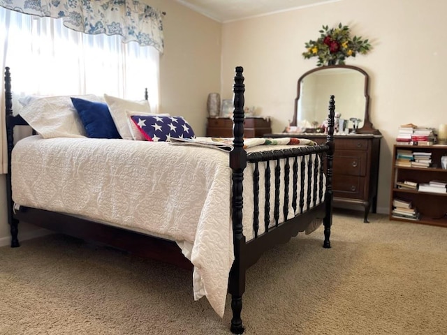 bedroom with light colored carpet