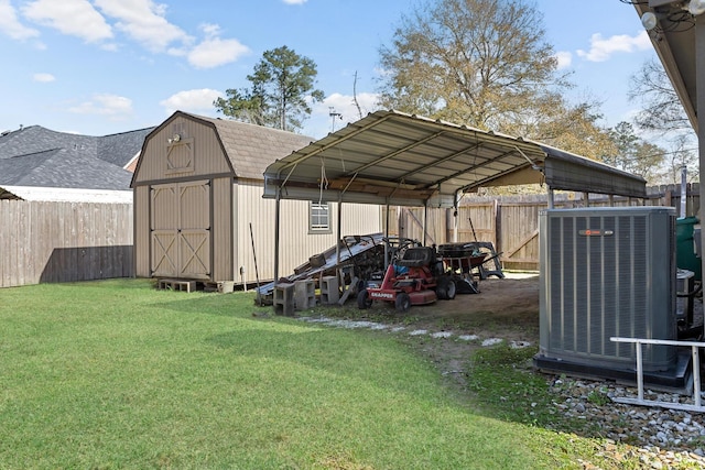 exterior space featuring a carport, a yard, and central AC unit