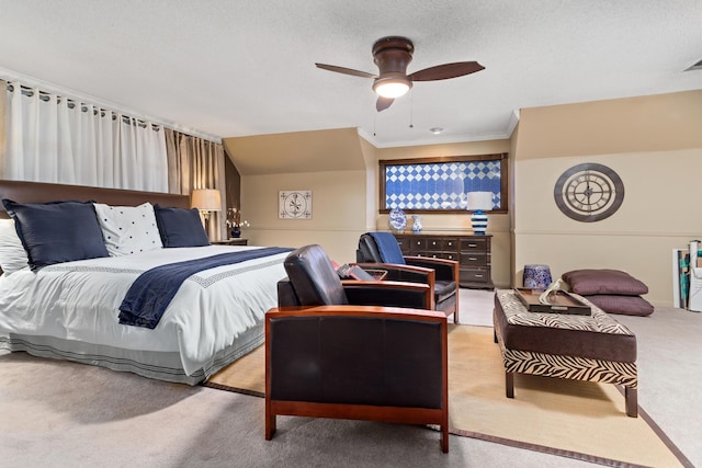 carpeted bedroom featuring crown molding, ceiling fan, and a textured ceiling