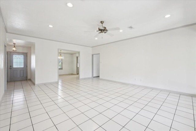 spare room featuring visible vents, baseboards, a ceiling fan, crown molding, and recessed lighting