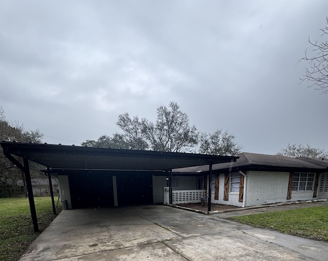 view of front of home featuring a carport