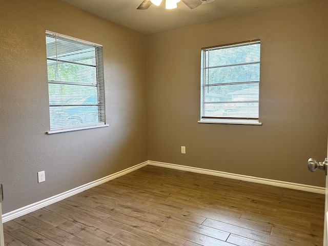 7165 Lewis Dr, Beaumont, TX 77708 - unfurnished room with a ceiling fan, wood finished floors, and baseboards